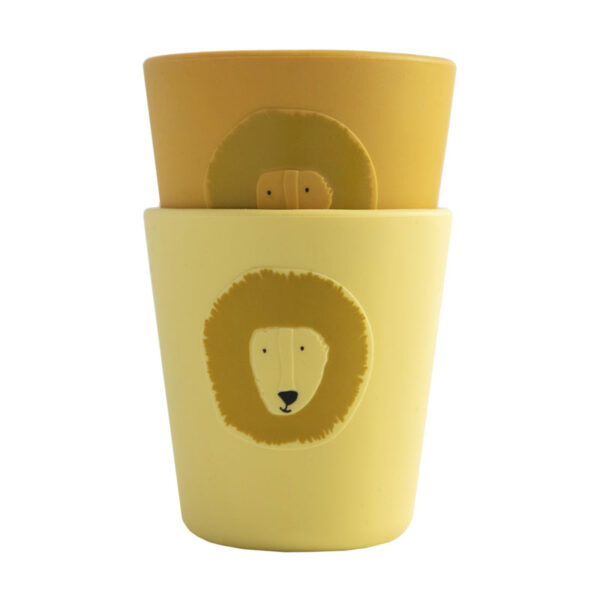 Trixie Baby Silikon Cup Löwe, zwei gelbe Becher mit Löwenmotiv ineinander gestapelt