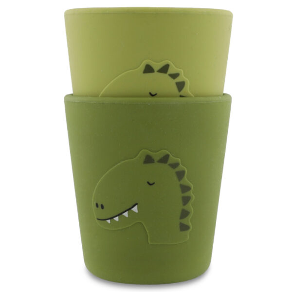 Trixie Baby Silikon Cup Dino, zwei grüne Becher mit Dinomotiv ineinander gestapelt