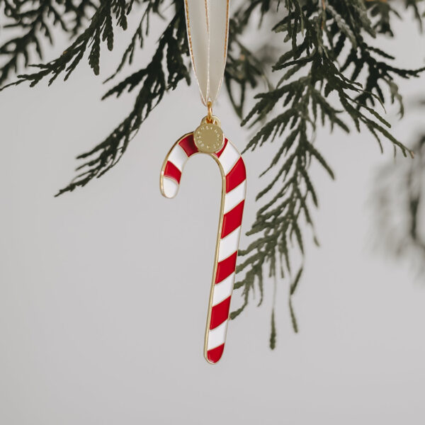 Eulenschnitt Baumschmuck Zuckerstange, am Tannenzweig hängend in Rot und Weiß mit Goldrand