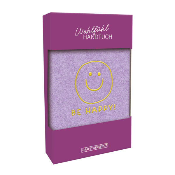 Grafikwerkstatt Wohlfühl-Handtuch Be happy, fliederfarbenes Gästehandtuch mit goldenem Smiley in lila Geschenkbox