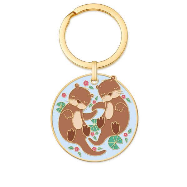 Grafikwerkstatt Schlüsselanhänger Otter, runder hellblauer Anhänger mit Otterpärchen und goldenem Ring